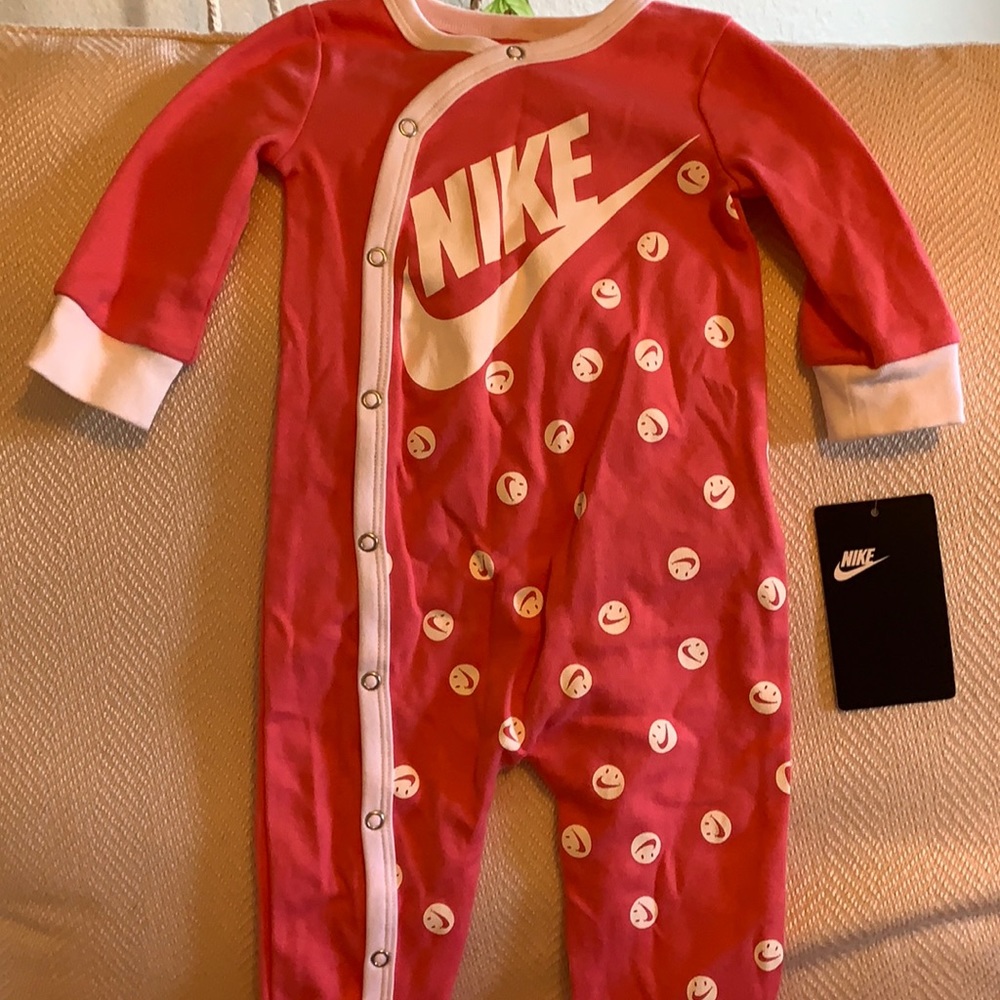 Nike Pink baby onesie